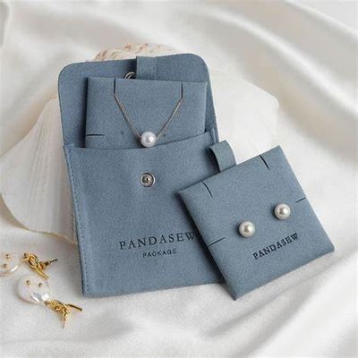 custom embossed suede microfiber jewelry pouch with insert card pads custom logo