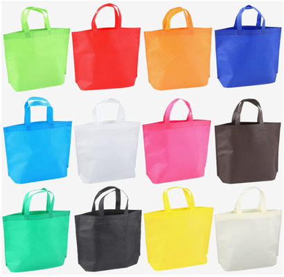 Sacos favoritos de festas não tecidos Sacos coloridos reutilizáveis Sacos não tecidos de cor sólida Sacos reutilizáveis de tote a granel com alças Sacos de mercearia não tecidos reutilizáveis
